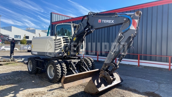 Picture of the Terex Tw 85 with 3 buckets and forks