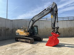 Bild des Volvo EC220DL mit 1 Baggerlöffel